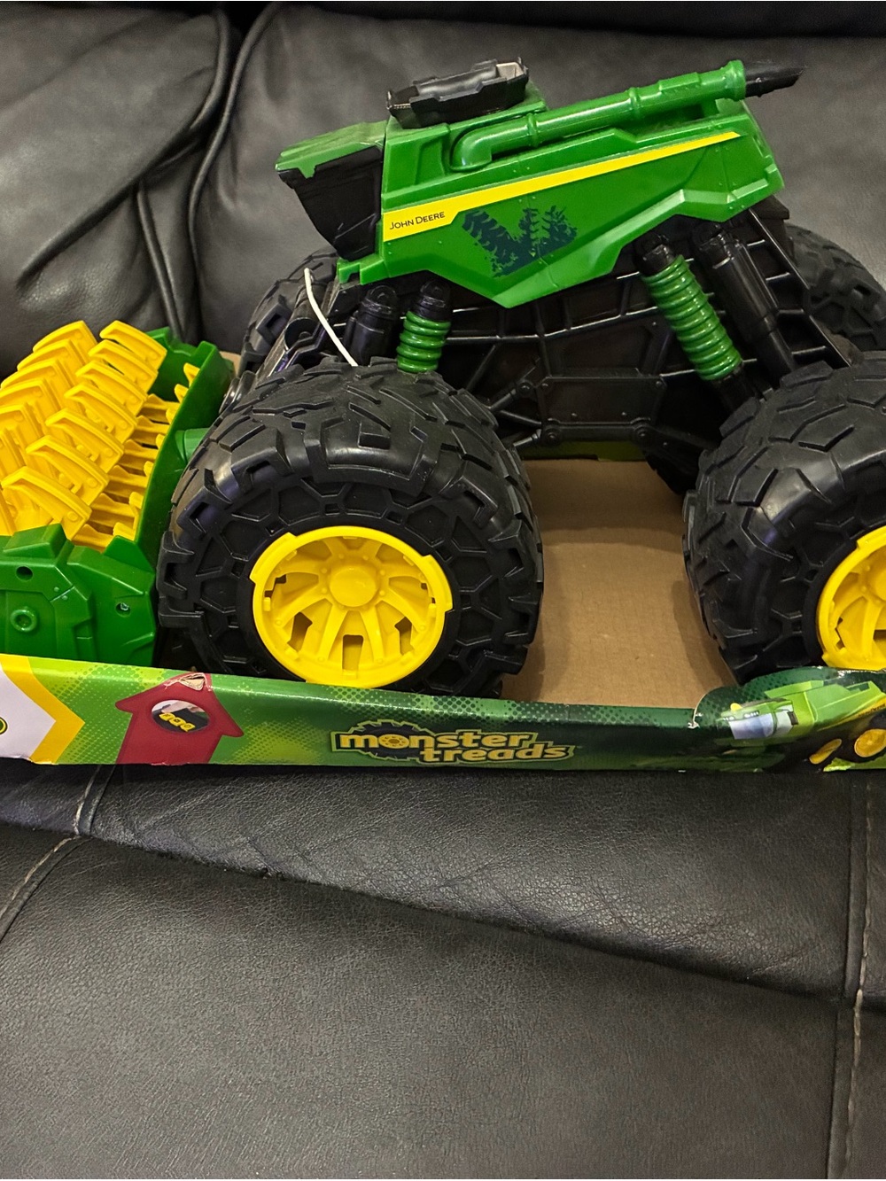 John Deere Green and Yellow Monster Treads combine harvester